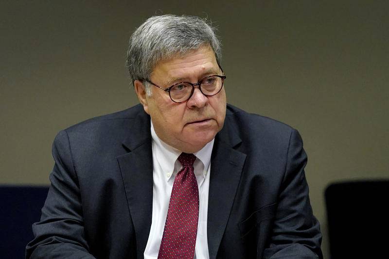 Attorney General William Barr meets with members of the St. Louis Police Department in St. Louis. Barr has announced he is resigning. (AP Photo/Jeff Roberson, Pool)