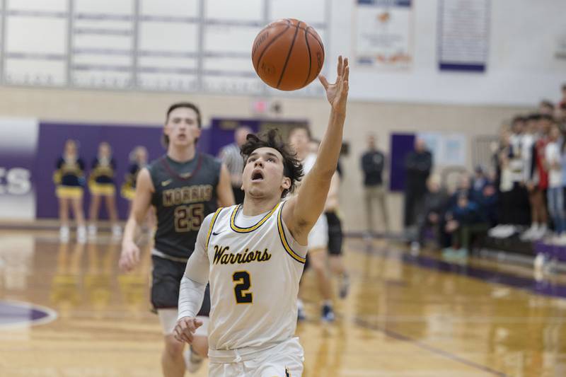 Sterling’s JP Schilling tracks down a pass against Morris Wednesday, Feb. 22, 2023 in the 3A sectional semifinal game.