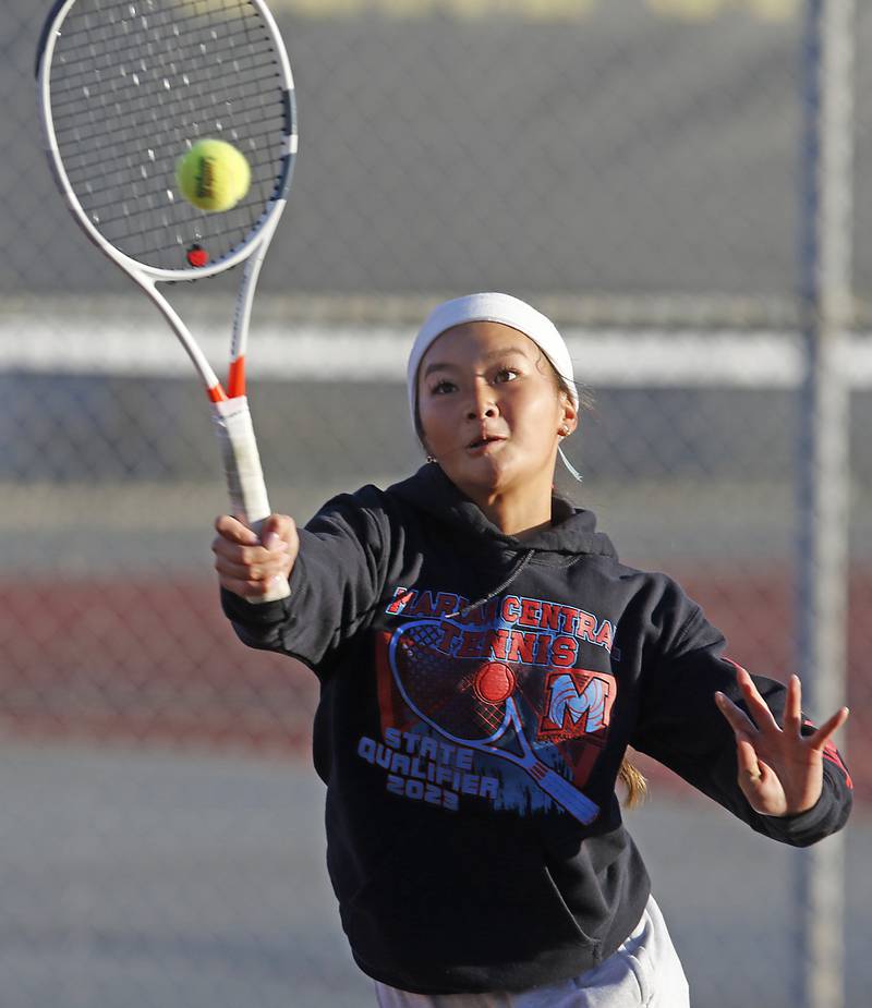 Marian Central’s Jordan Cheng returns the ball Thursday, Oct. 23, 2025, during the first day of the IHSA State Girls Tennis Tournament at Schaumburg High School.