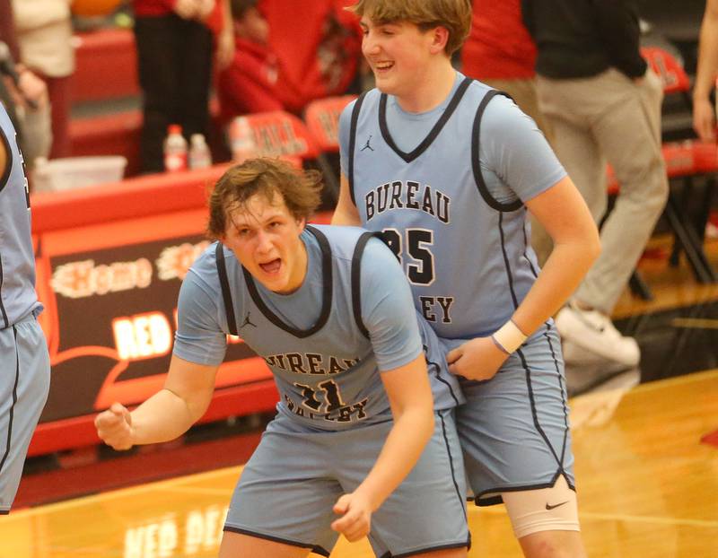 Bureau Valley's Blake Foster reacts with teammte Brad Schoff after defeating Hall on Wednesday, Jan. 28, 2026 at Hall High School.