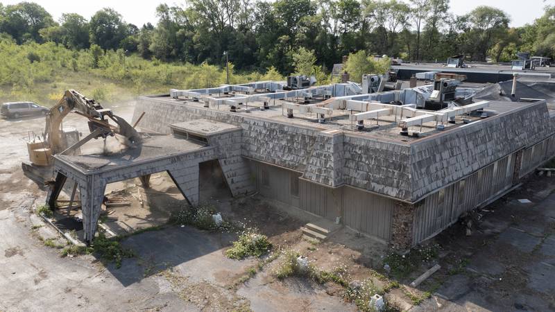 Crews started demolition work Thursday, Aug. 5, 2021, on the building that used to house Andre's Steakhouse and Magnolias of Richmond along Route 12 in Richmond.