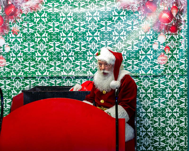 Santa greets a guest at the Lombard Jingle Bell Jubilee. Dec 2, 2023