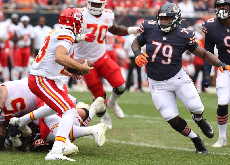 Chicago Bears defensive tackle Trevon Coley pressures Kansas City Chiefs quarterback Dustin Crum during their preseason game Aug. 13, 2022, at Soldier Field in Chicago.