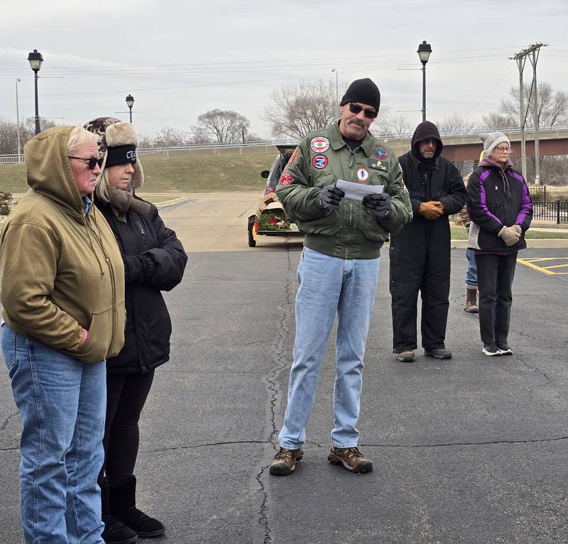 A crowd gathers Saturday, Dec. 14, 2024, at the Middle East Conflicts Wall in Marseilles to remember those who died during the Wreaths Across America ceremony.