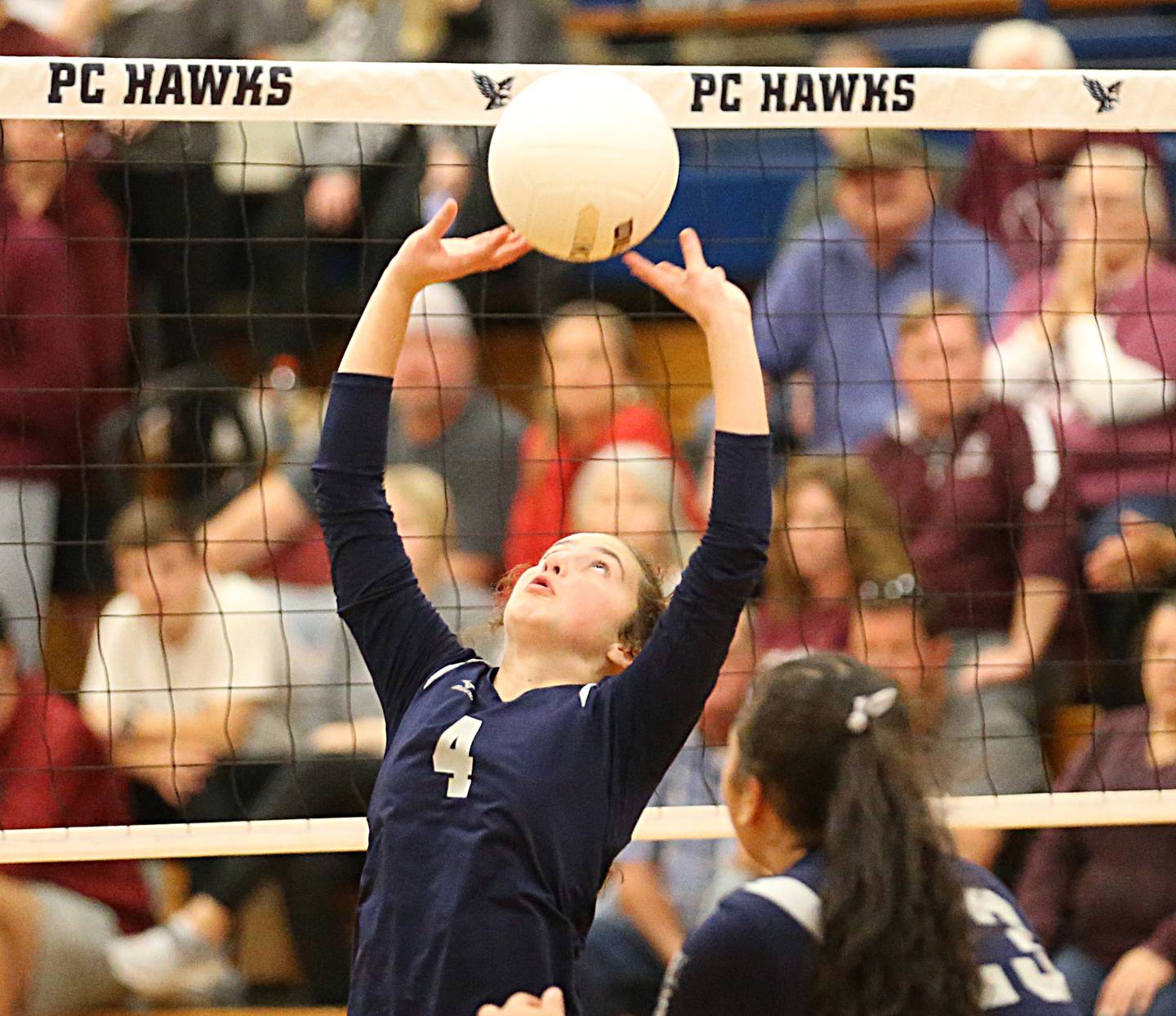 Fieldcrest's Macy Gochanour sets the ball in play for teammate Lyla Armstrong in the Class 2A Sectional volleyball final at Prairie Central High School on Wednesday, Nov. 2, 2022 in Fairbury.