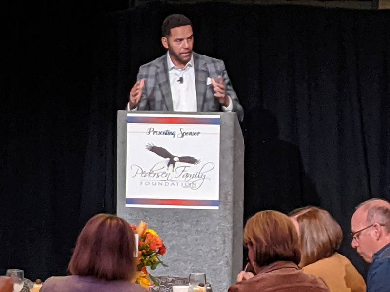 Best selling author Steve Pemberton talks about overcoming challenges during CASA Kane County luncheon on Thursday.