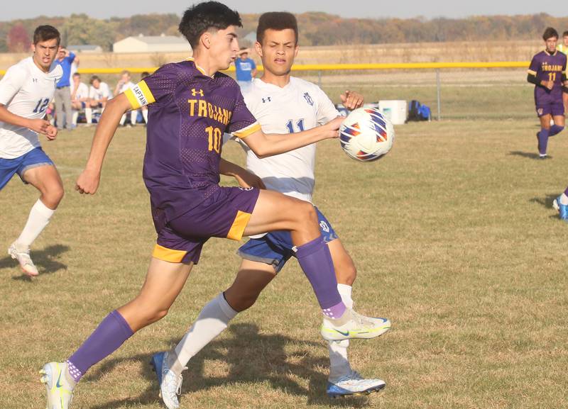 Mendota's Johan Cortez kicks the ball away from Princeton's Levi Boggs during the Class 1A Regional final game on Tuesday, Oct. 22, 2024 at Serena High School.