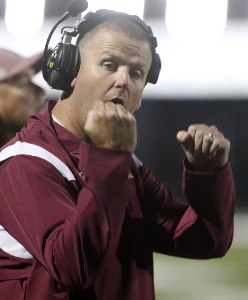 Morris Head Coach Alan Thorson works the referee during a Kishwaukee River Conference / Interstate 8 Conference crossover football game Friday, Sept. 30, 2022, between Richmond-Burton and Morris at Richmond-Burton Community High School in Richmond.
