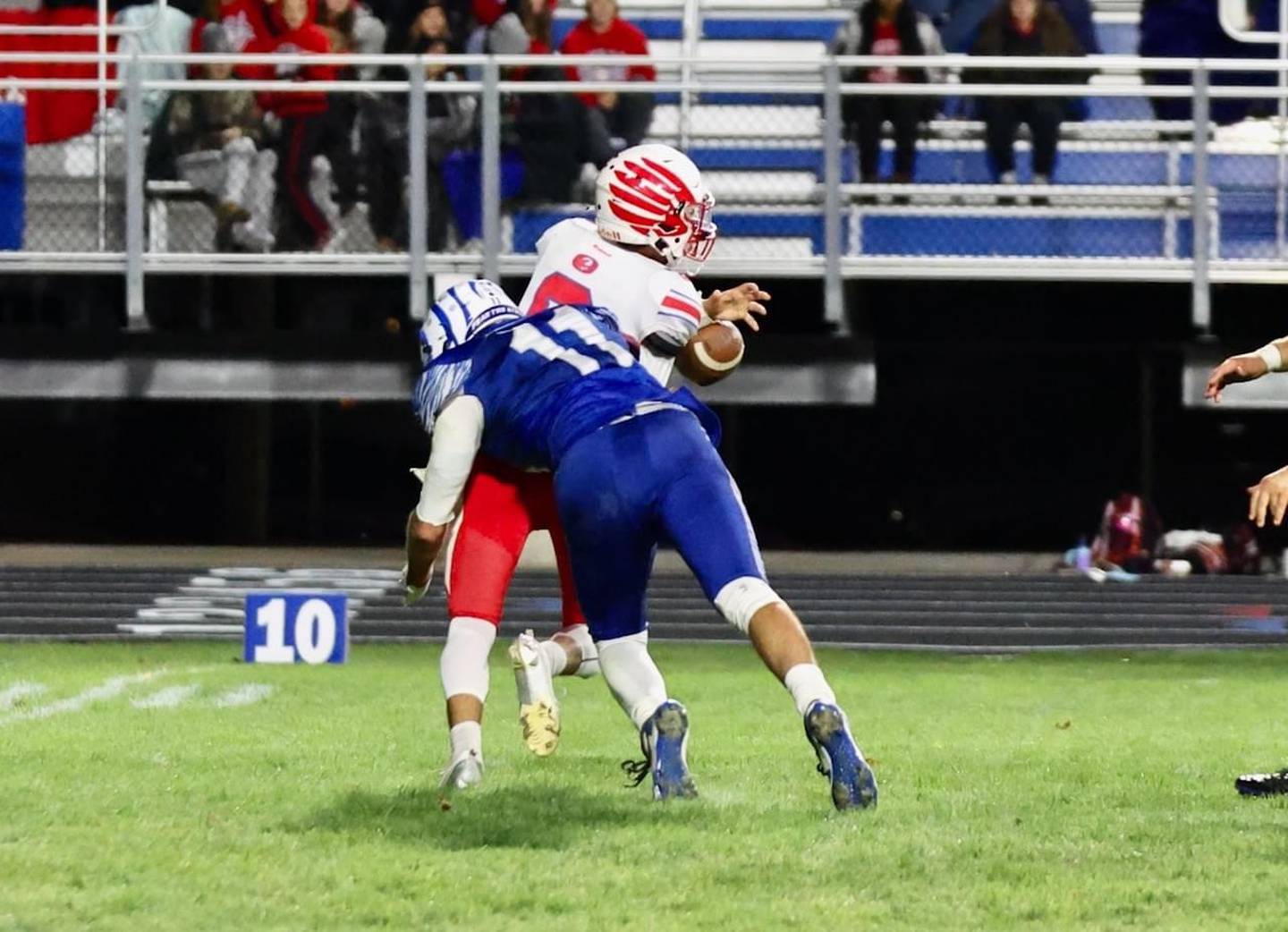 Princeton's Noah LaPorte hits Oregon's QB Benny Olalde with a blind-side blitz, forcing a fourth quarter fumble Friday night at Bryant Field.