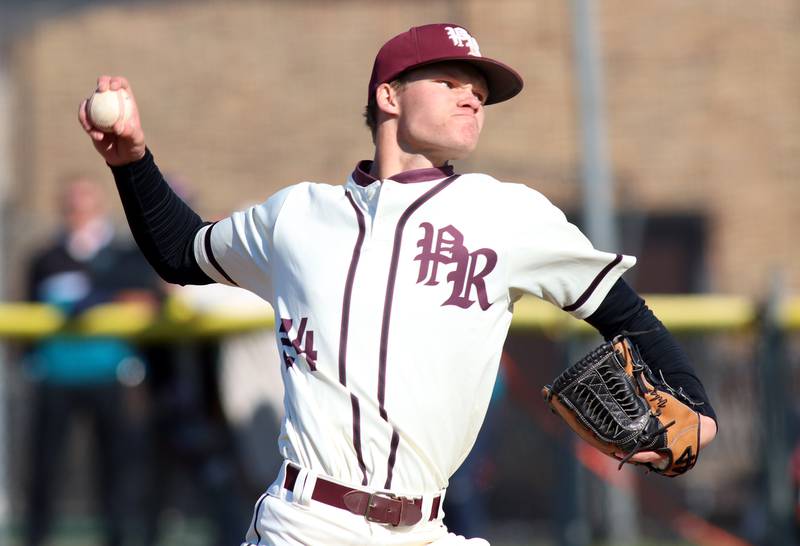 Prairie Ridge’s Trace Vrbancic deals against Woodstock North in Class 3A Regional baseball action at Cary Thursday.