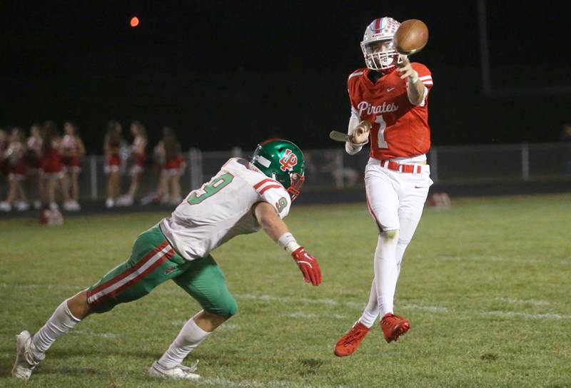 Ottawa quarterback Mark Munson slings a pass in front of L-P's Jaron Morscheiser on Friday, Sept. 12, 2025 at King Field.