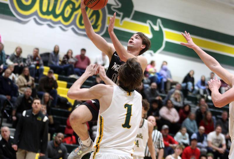 Prairie Ridge’s Cade Collins goes to the hoop in varsity boys basketball at Crystal Lake South Friday night.