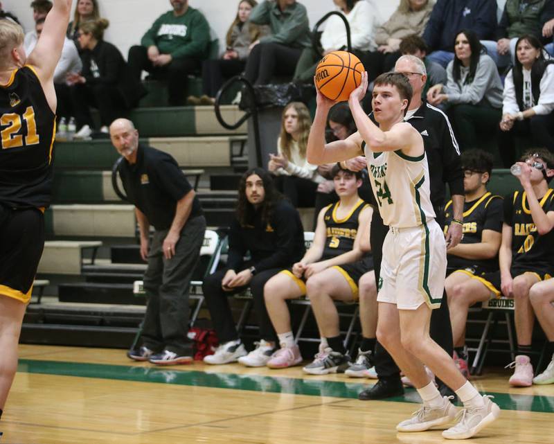 St. Bede's Phil Gray shoots a wide-open shot over Ashton-Franklin Center's Kyle Goldman during the Class 1A Regional quarterfinal game on Monday, Feb. 24, 2025 at St. Bede Academy.