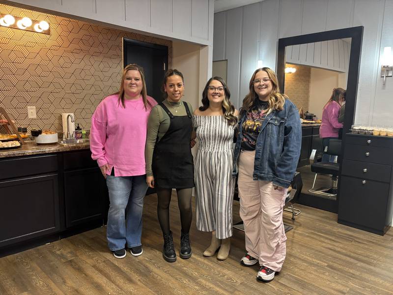 From left, Jessica Addis-McLaughlin, Celia Lopez, Tana Mareta and Brittany Brown pose inside Gloss Society during the salon’s opening Monday, Jan. 5, at its new location, 2320 St. Vincent Ave. in La Salle. The four longtime stylists recently combined forces and relocated the business to the St. Vincent Avenue space.