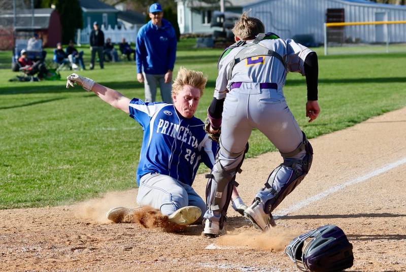 Princeton's Jace Stuckey tries to beat the throw home Monday at Prather Field, but is tagged out by Mendota catcher Brody Hartt. The Tigers won 6-2.