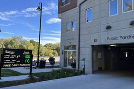 Oswego Village Board OKs $5 fee for overnight parking in downtown parking deck
