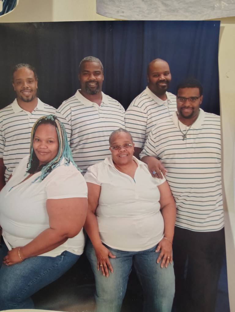 DeKalb resident Porter Saunders poses for a picture with his mother and siblings.