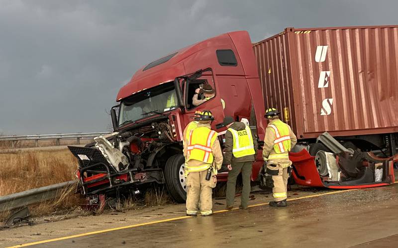 Princeton firefighters work the scene of a semi crash on Interstate 80 on top the Illinois Route 34 overpass on Monday, March 19, 2025 in Princeton. The accident happened  in the eastbound lane of Interstate 80 shortly after 5p.m. Illinois State Police also responded to the incident. Traffic was down to one-lane for about an hour.