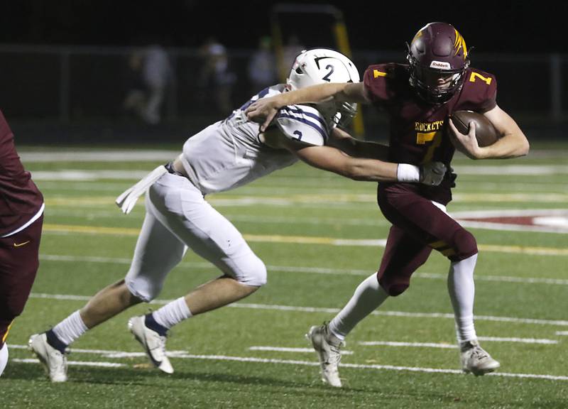 St. Viator's Charlie Dolsen tackles Richmond-Burton's JT Groh during a IHSA Class 4A first round playoff football game Friday, Oct. 27, 2023, at Richmond-Burton High School in Richmond.