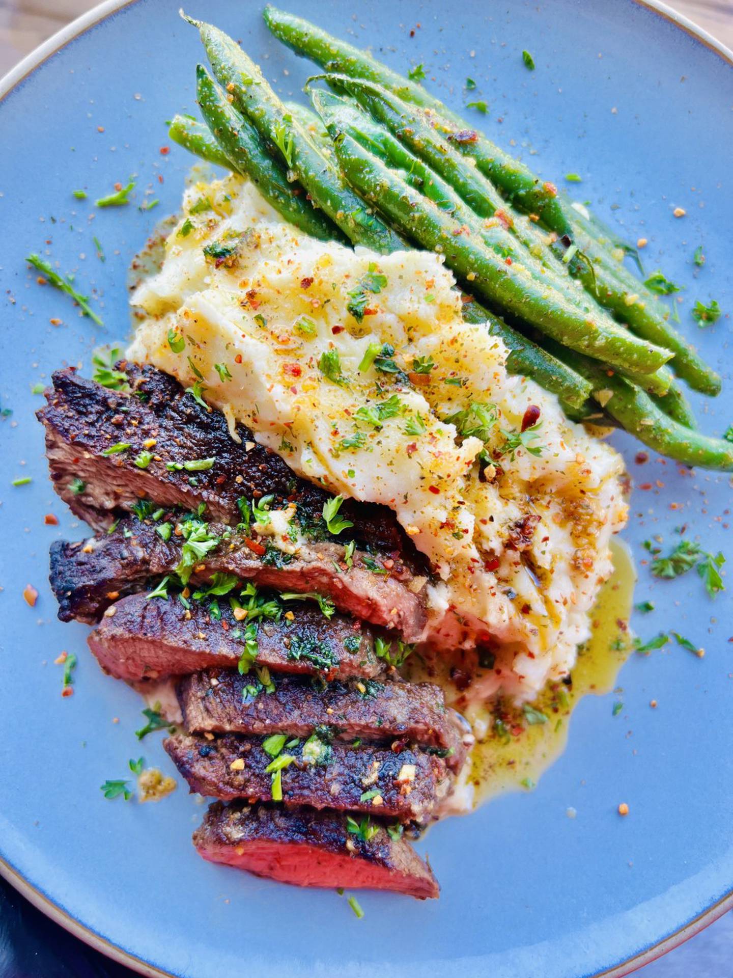 Pictured are seared filet of beef with honey mashed potatoes and lemon soaked green beans as prepared by Arron Sain of Plainfield, owner of Insainly Fit Meals.