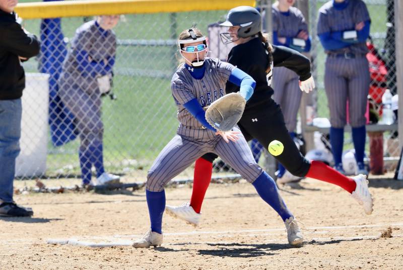 Princeton first baseman Ellie Harp makes the play Saturday with Hall's Leah Burkhart running to the base.