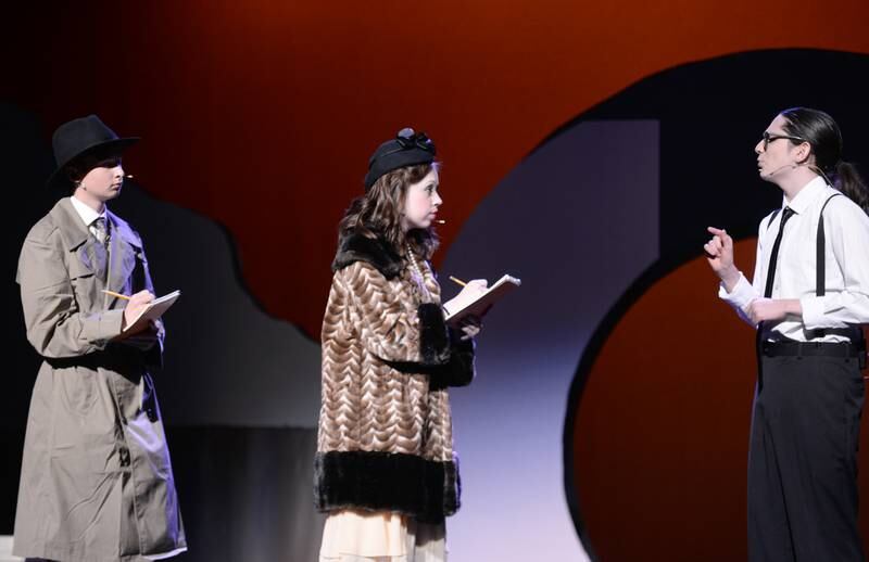 Lyons Township's (left-right) Danny Callahan, Delilah Pawlowski and Daniel Nunez rehearse their lines for the upcoming performance of Radium Girls Sunday, Oct. 27, 2024.