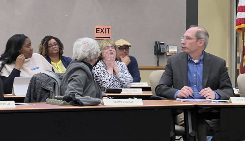 DeKalb County Board member Rhonda Henke, a Republican from District 1, holds her face while deliberating her vote regarding an intergovernmental agreement between DeKalb County and the city of Sycamore for the mounting of license plate readers on utility poles on county owned land. The agreement was passed by the County Board in a 16-7 vote on March 15, 2023.