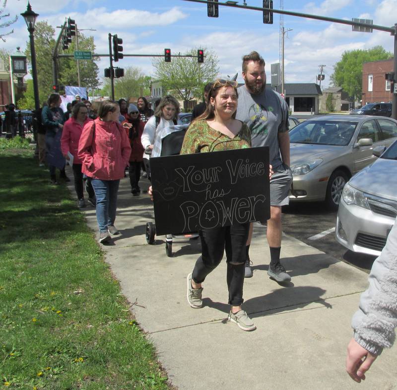 About 50 people attended the March to Believe organized by Safe Journeys on Saturday, April 29, 2023, at Washington Square in Ottawa. The event focused on believing victims of domestic and sexual violence.