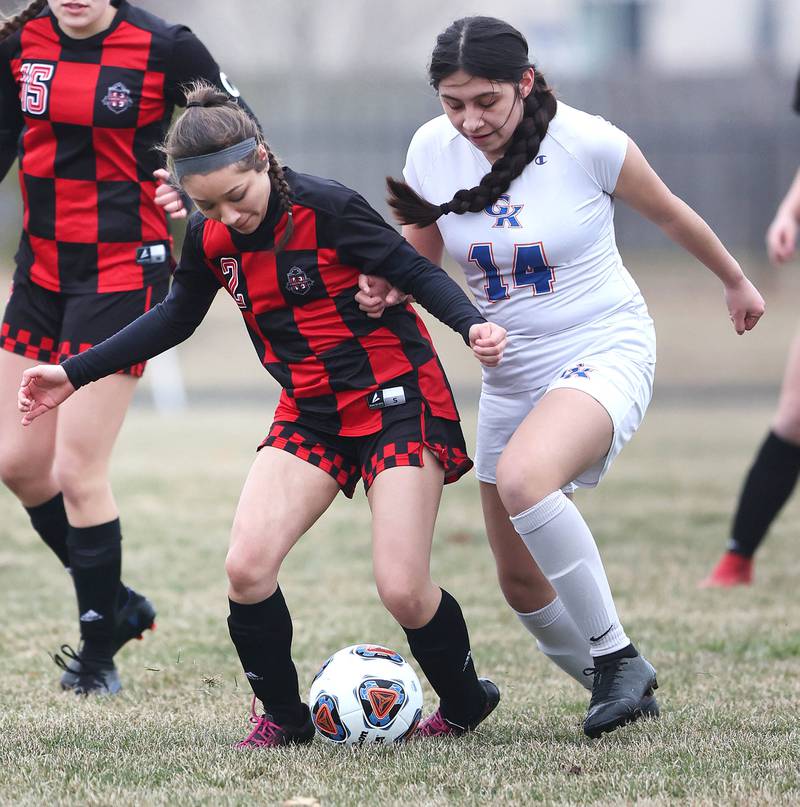 Indian Creek's Sally Diaz (left) and Genoa-Kingston's Yuliza Fuentes fight for possession during their game Thursday, March 16, 2023, at Pack Park Sports Complex in Waterman.