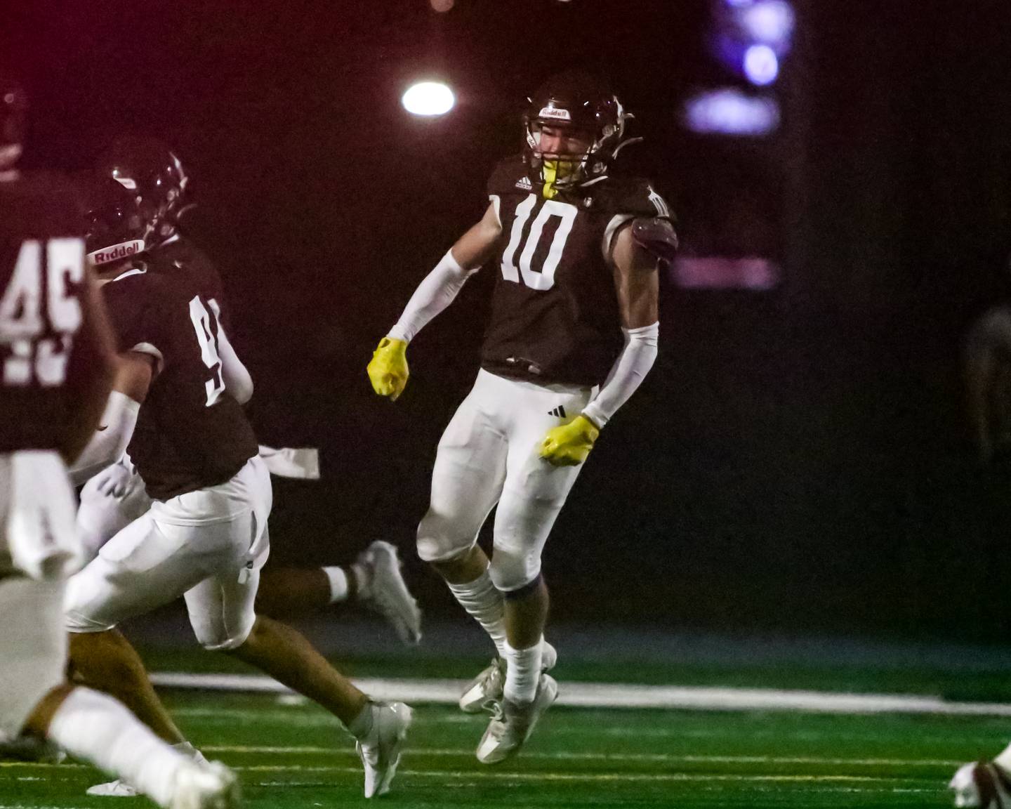 Joliet Catholic's Mikey Brow (10) celebrates an interception during a football game between Marist at Joliet Catholic on Friday, Sept 20th, 2024  in Joliet.
