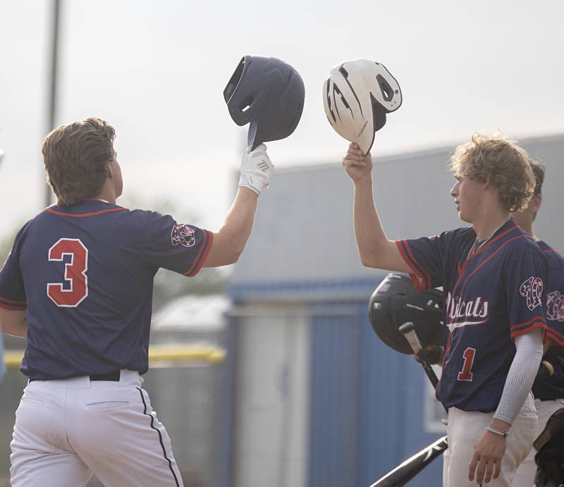 Chase Chappell (left) of the Whiteside Wildcats semi-pro baseball team celebrates his home run against Palmer with Daylen Stage Wednesday, July 19, 2023.