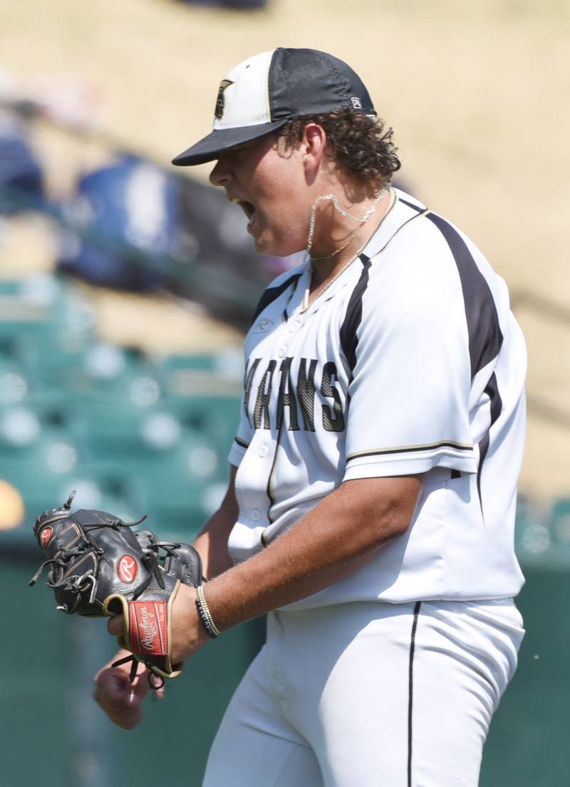 Joe Lewnard/jlewnard@dailyherald.com
Sycamore relief pitcher Matthew Rosado celebrates after the Spartans’ ended an Effingham scoring threat during the Class 3A  third-place state baseball game in Joliet Saturday.