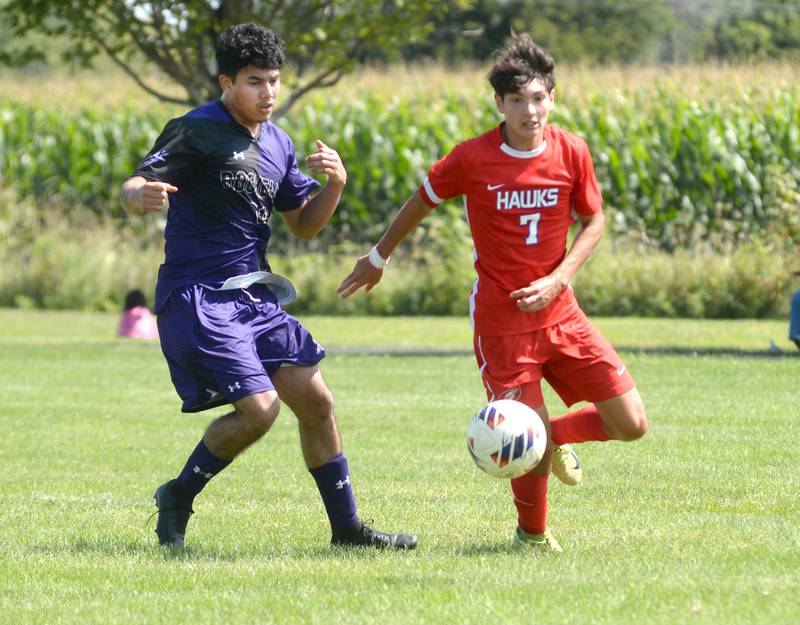 Oregon's Aiden Hammer (7) zeroes in on the ball as Rochelle's Danny Garcia (19) gives chase on Saturday, Aug. 30, 2025 at the Oregon-Stillman Varsity Soccer Tourney at Oregon Park West.