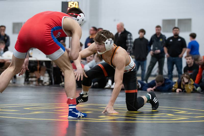 Sandwich's Cooper Corder, right, and Morrison's Caleb Modglin wrestle in the 150-pound championship match during the Reed-Custer Comet Classic Wrestling Invite on Saturday, Jan 17.