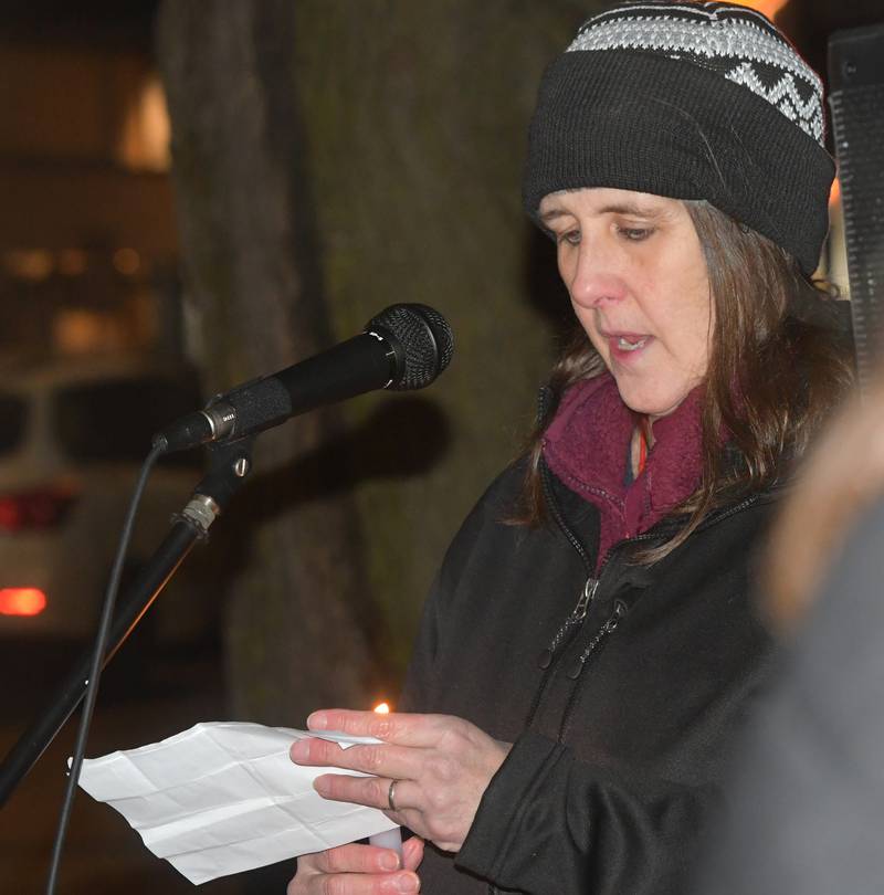Jan Buttron of Indivisible of Ogle County speaks during a candlelight vigil on Friday, Jan. 9, 2026  for Renee Nicole Good, the Minnesota woman who was shot and killed during an Immigration and Customs Enforcement (ICE) operation on Jan. 7 in Minneapolis. The Oregon event was held on one corner of the Ogle County Courthouse Square in Oregon and organized by Indivisible of Ogle County.