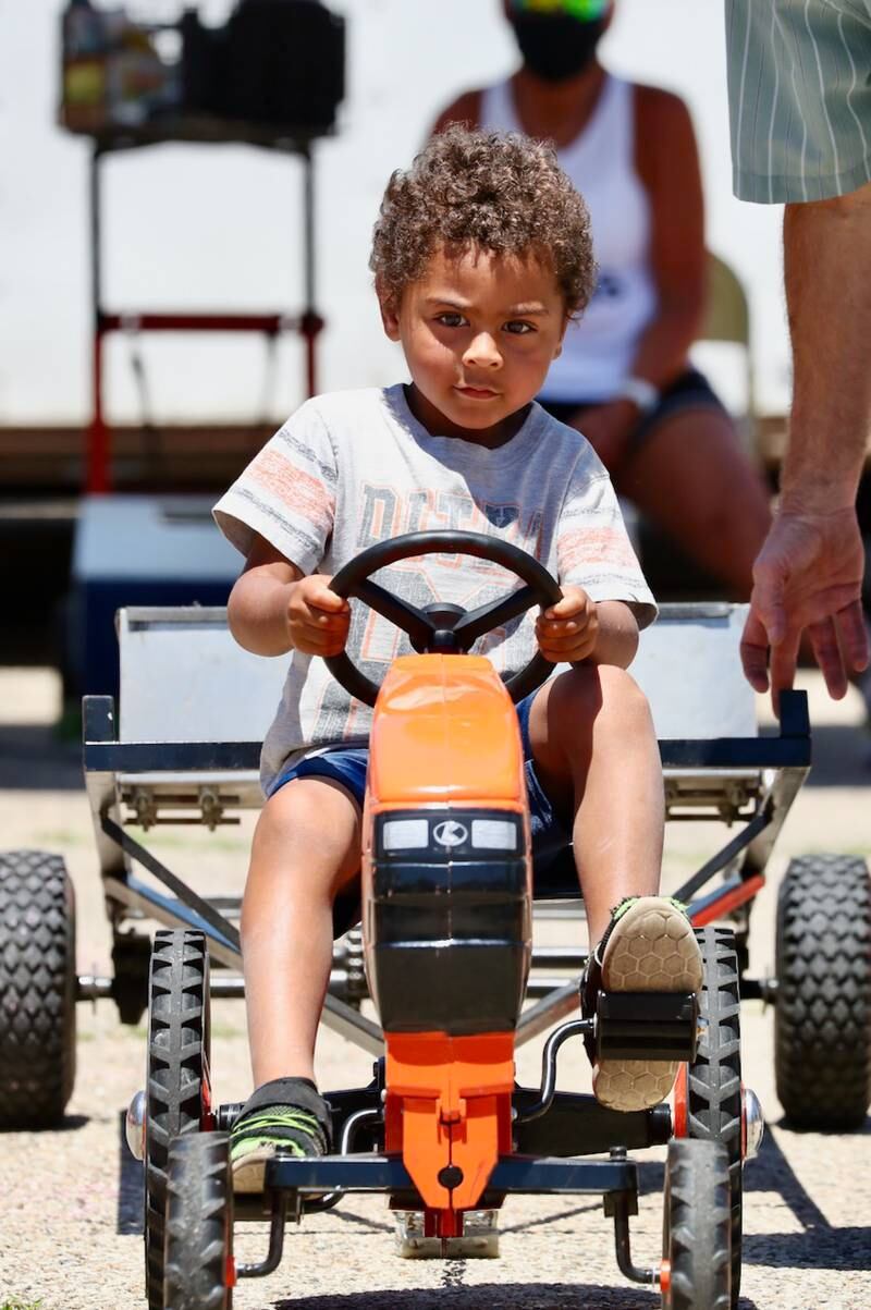 Kids were able to drive around individual tractors during Beef and Ag Days.