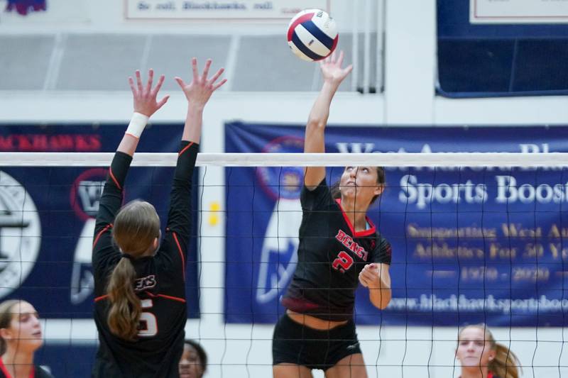 Benet’s Gabriele Stasys (2) goes up for a kill attempt against Wheaton Warrenville South during a Class 4A West Aurora Sectional semifinal volleyball match at West Aurora High School on Tuesday, Nov. 5, 2024.