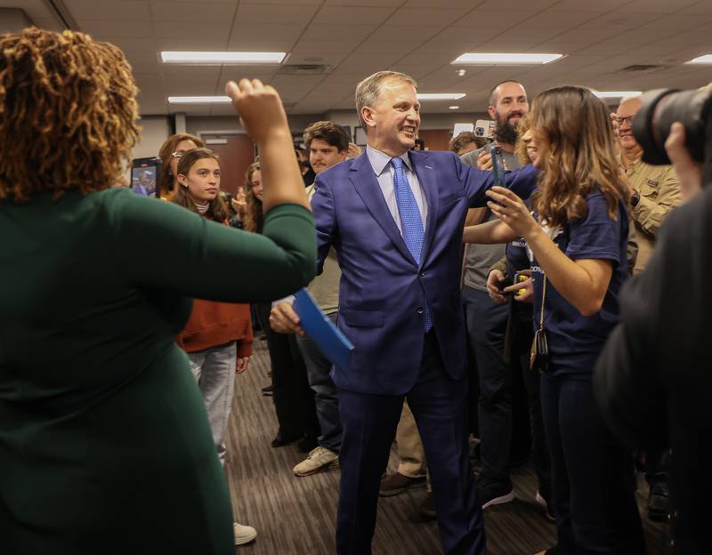 U.S. Rep. Sean Casten celebrates with supporters after defeating Orland Park Mayor Keith Pekau at Chicagoland Laborers' District Council in Burr Ridge, Ill. on Tuesday, Nov. 8, 2022.