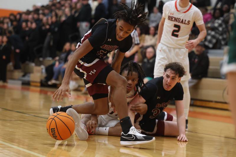 Plainfield North’s Darin Ashiru recovers the loose ball against Plainfield East on Tuesday, Jan 14, 2025.