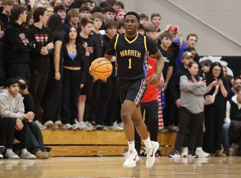 Warren's Jaxson Davis (1) brings the ball up court during the When Sides Collide Shootout basketball tournament between Benet Academy and Warren Township high schools on Saturday, Jan. 24, 2026 in Lisle, IL.