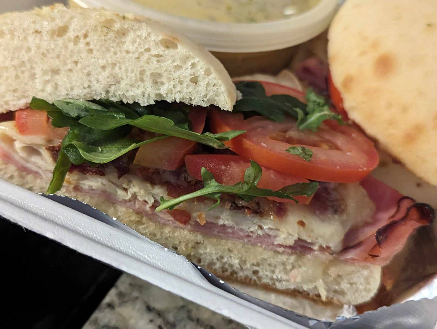 The Dead Beat Club at Freedom Brothers Pizzeria & Alehouse in Plainfield was a wonderful turkey club sandwich with rosemary ham, applewood bacon, Swiss cheese, arugula, Roma tomatoes and mayonnaise on a crostini bread.