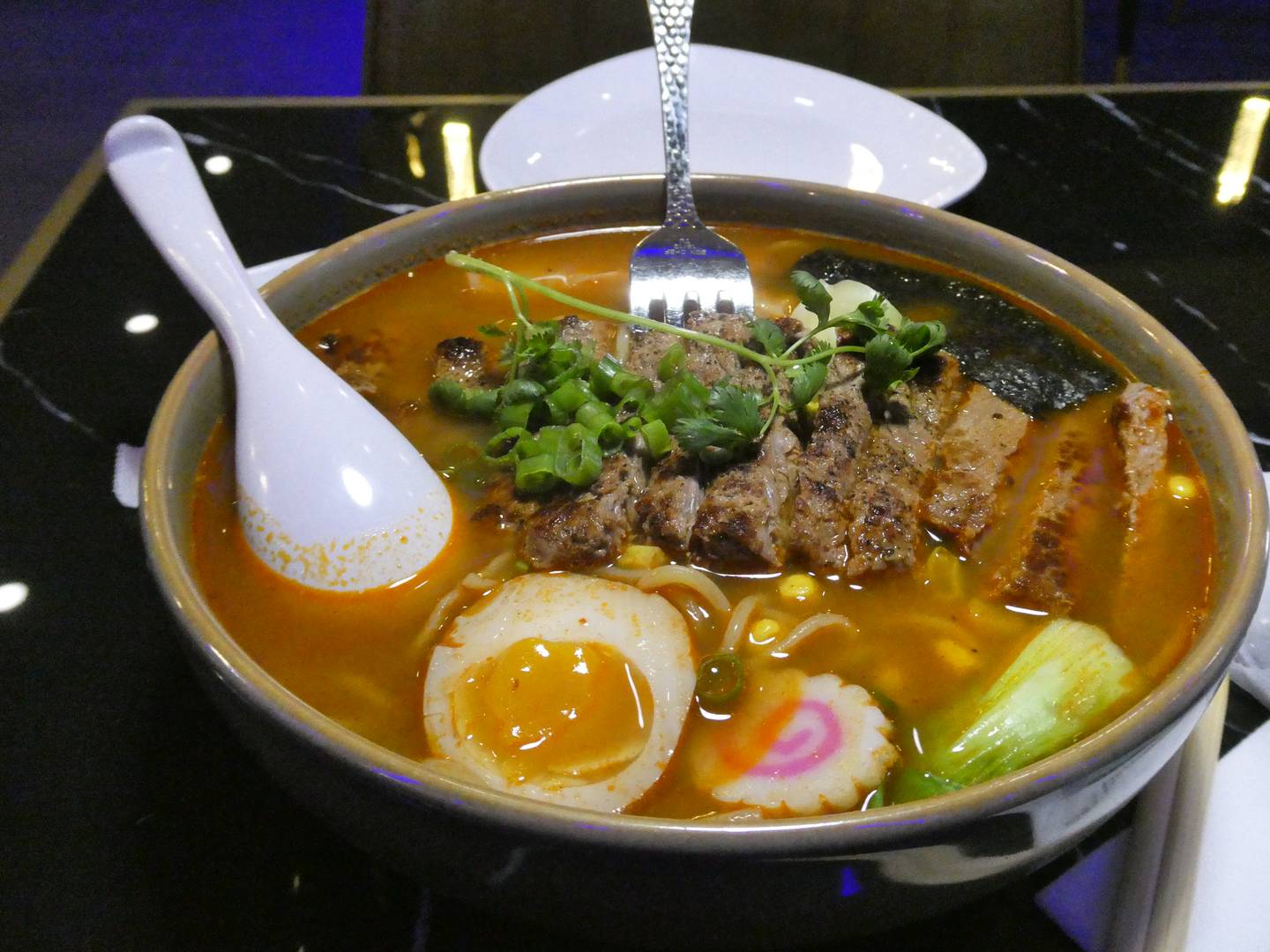 Spicy ramen with beef at Tasty Bistro in Crystal Lake.