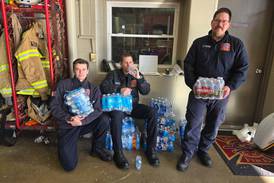 Rochelle library, DAR honor First Responders Day with quilts, water donation
