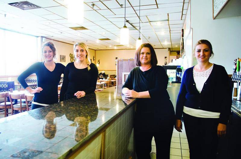 Waitresses Amanda VanWinkle (left), Gentiana Dalipi and Kylee Hasbrook and owner Judy Dalipi welcome you to try out the new Kopper Kitchen at Northland Mall.