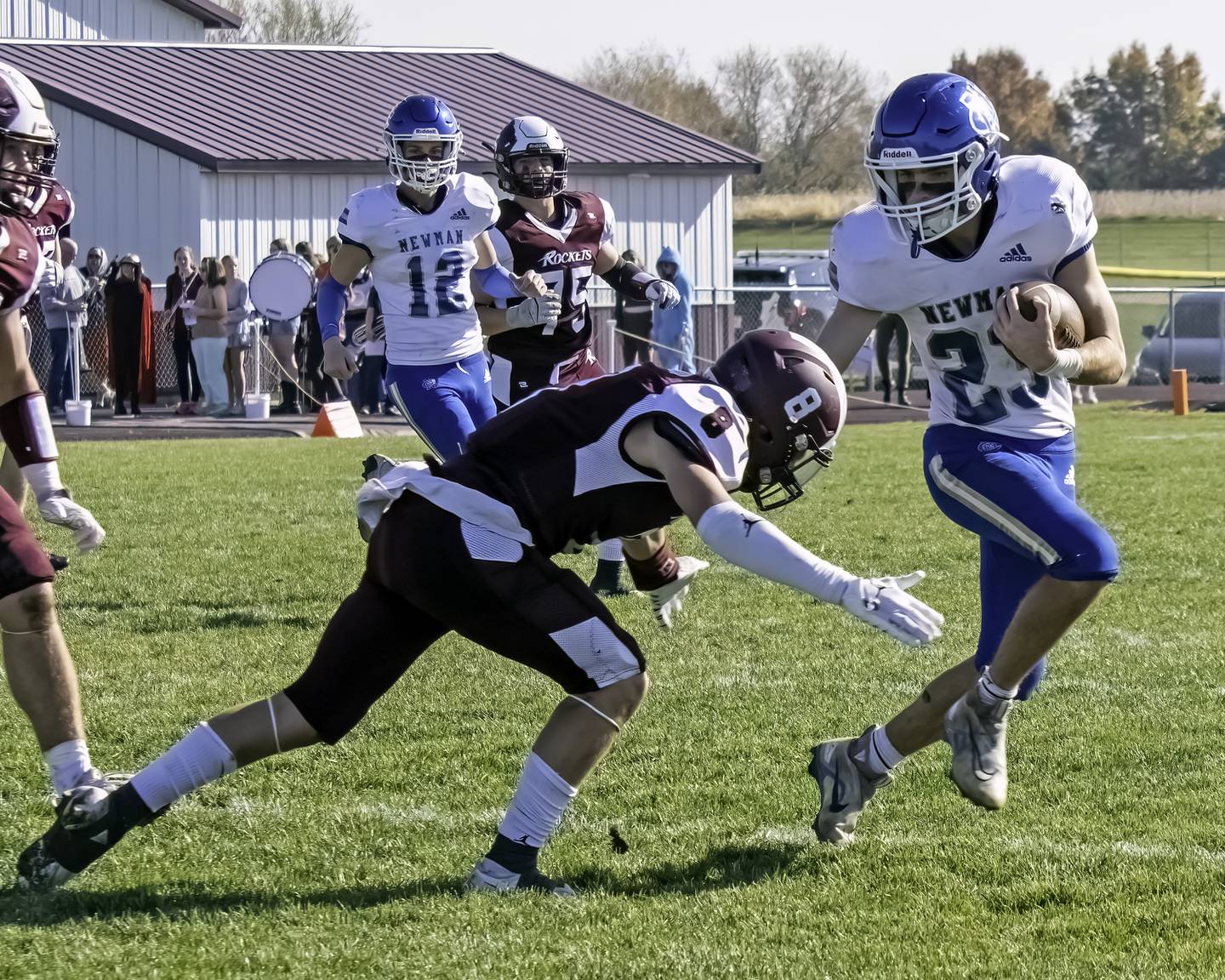 Newman’s Nolan Britt looks to get away from a Rockridge tackler Saturday, Oct. 29, 2022.