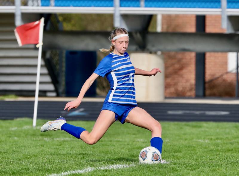 PHS freshmen Chloe Ostrowski winds up for a kick Thursday night at Bryant Field.