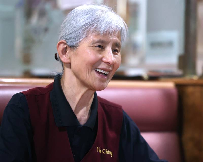 Marilyn Yin, co-owner of Yen Ching, smiles as she talks about her longtime customers Thursday Jan. 22, 2026, at the restaurant in DeKalb. The popular eatery on Lincoln Highway will be closing by the end of the year after over 40 years in business.