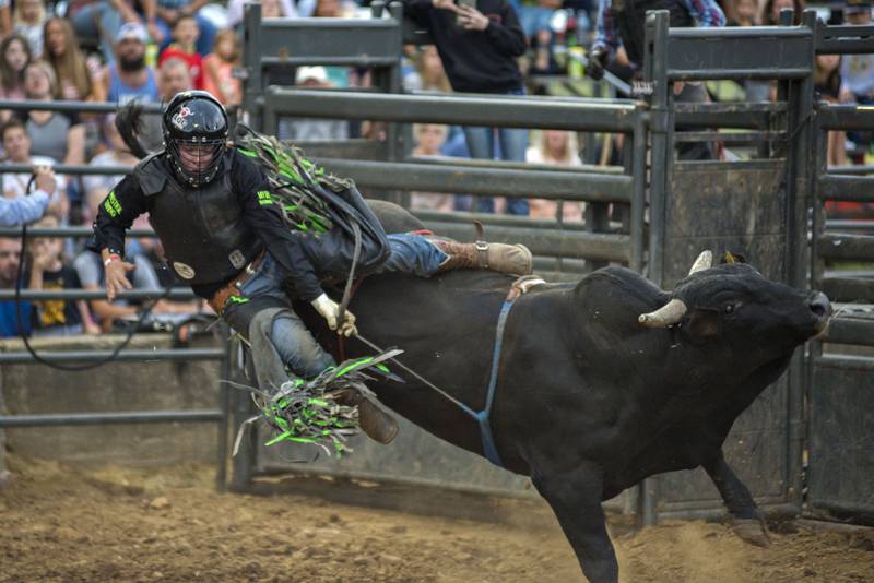 Polo's Colton Gunder is thrown from Obama at the 2021 Carroll County Fair. Though the ride was short, the local crowd gave Gunder a large applause.