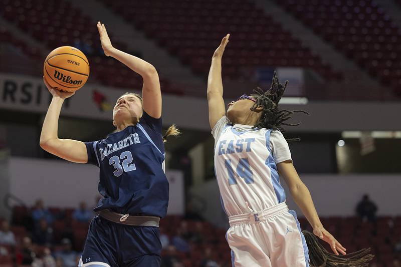 Nazareth’s Stella Sakalas puts up a shot against Belleville East’s DeAsia Willis Friday, March 6, 2026, in the Class 4A girls state semifinal game at CEFCU Arena at ISU.