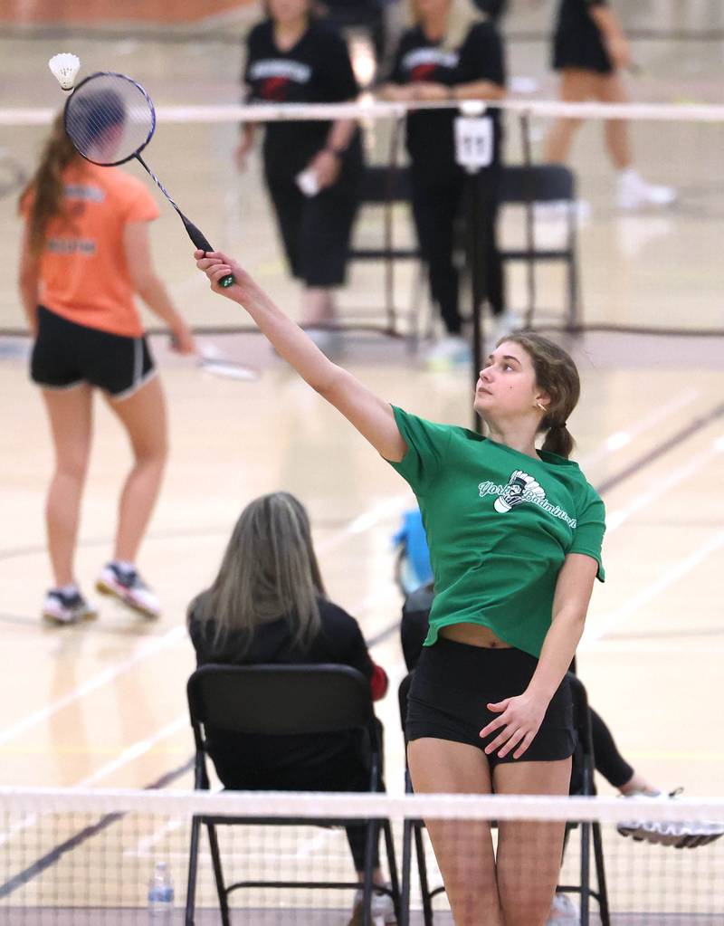 York junior Mia Koenigsberger reaches for a shot during her match against Katie Moy, a sophomore from Stevenson, Friday, May 10, 2024, during the IHSA State Badminton Finals at DeKalb High School. Koenigsberger fell to Moy in her first round match.